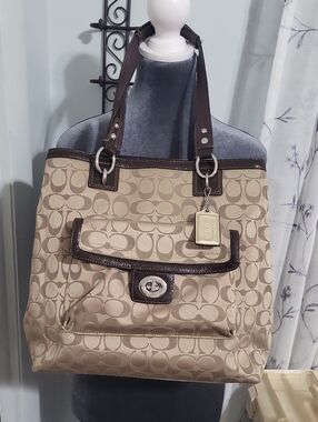 Coach Beige Signature Tote with Dark Brown Trim and Front Pocket